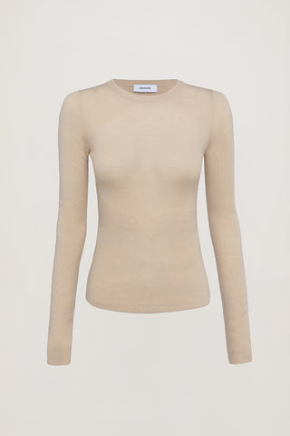 Beige long-sleeve top on a white background