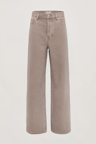 Tan wash wide leg and low rise jeans on a white background