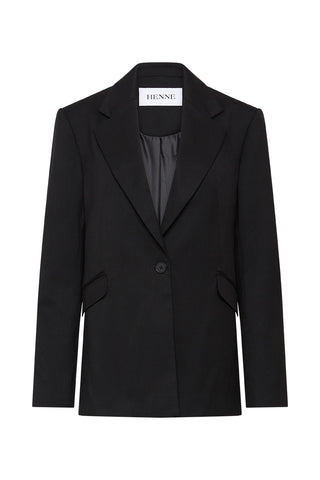 A black oversized blazer on a white background