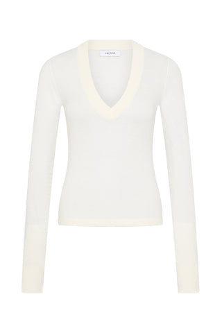 A long sleeve, V-neck top on a white background
